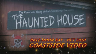 image of haunted house sign, link to video